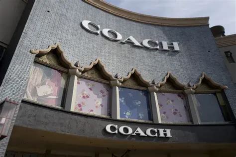 Maker of Coach handbags calls off merger with company that 